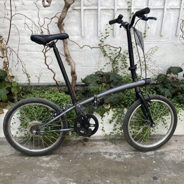 B’Twin Tilt Pliant Vélo en dépot-vente Les Mains Dans Le Guidon