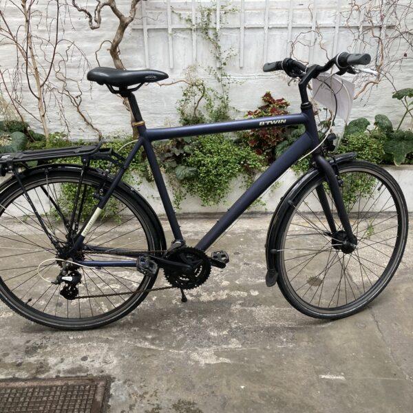 B’Twin Hoprider Vélo occasion Les Mains Dans Le Guidon