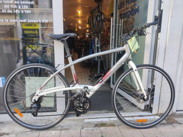 Vélo VTC Triban “7 Road” Vélo en dépot-vente Les Mains Dans Le Guidon