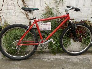 VTT Rouge Vélo occasion Les Mains Dans Le Guidon