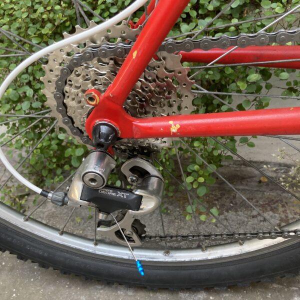 VTT Rouge Vélo occasion Les Mains Dans Le Guidon
