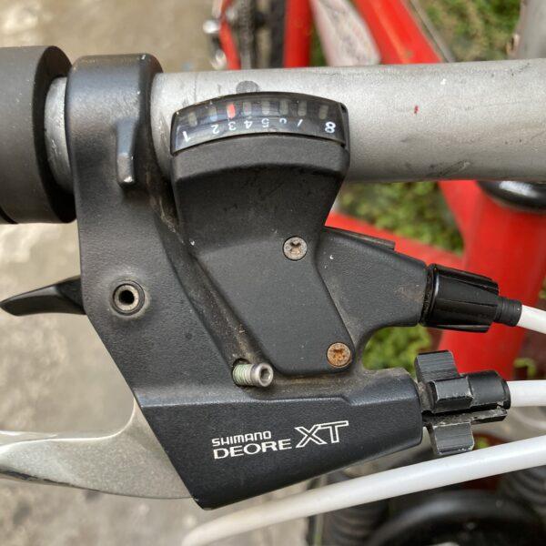 VTT Rouge Vélo occasion Les Mains Dans Le Guidon