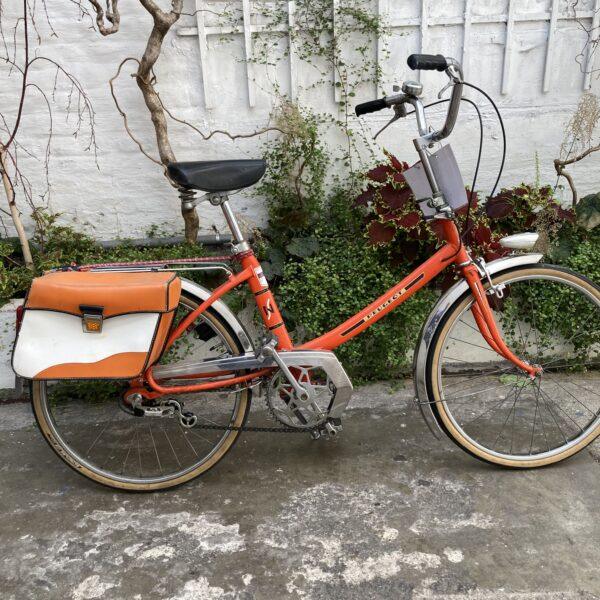 Peugeot NS Orange Vélo en dépot-vente Les Mains Dans Le Guidon