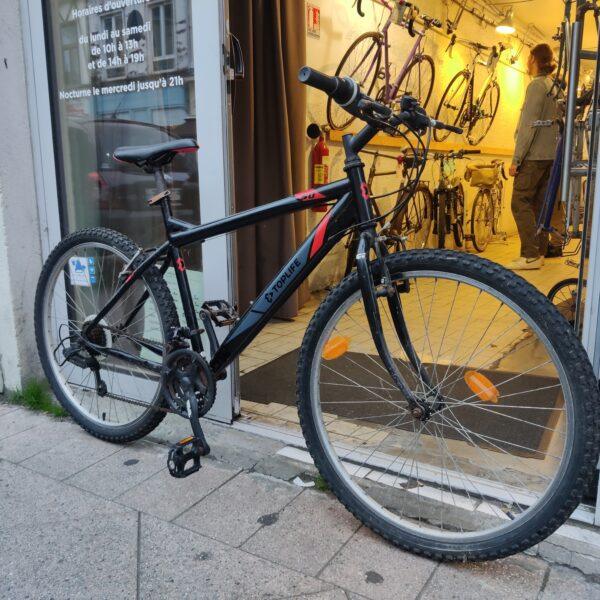 VTT noir/rouge “Top life” Vélo occasion Les Mains Dans Le Guidon