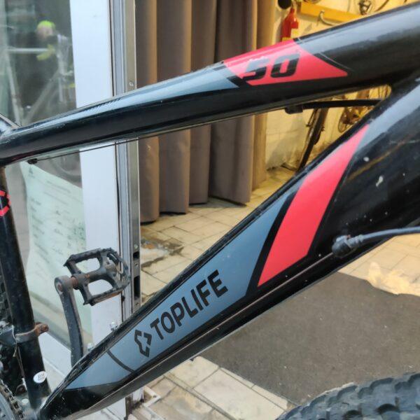 VTT noir/rouge “Top life” Vélo occasion Les Mains Dans Le Guidon