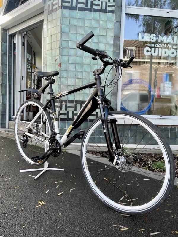 VTC Optimalp taille M Vélo en dépot-vente Les Mains Dans Le Guidon