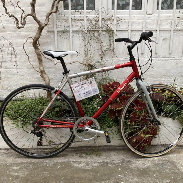 Route-Ville B’Twin 6061 Vélo en dépot-vente Les Mains Dans Le Guidon